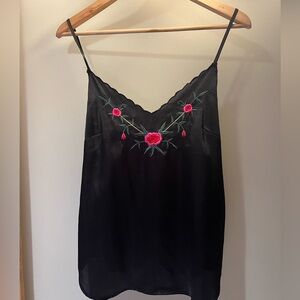 Urban sleeveless top with engraved flower design size M